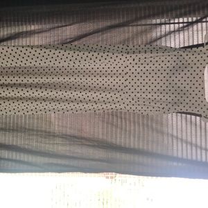 This is a poka dot white and black dress